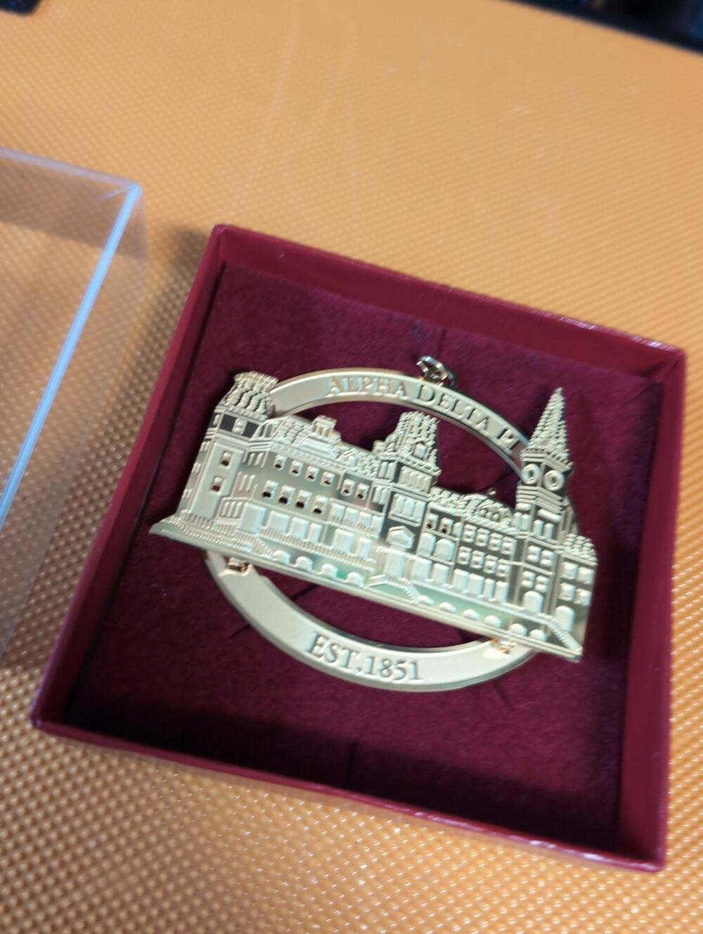 Alpha Delta Pi commemorative brass ornament
